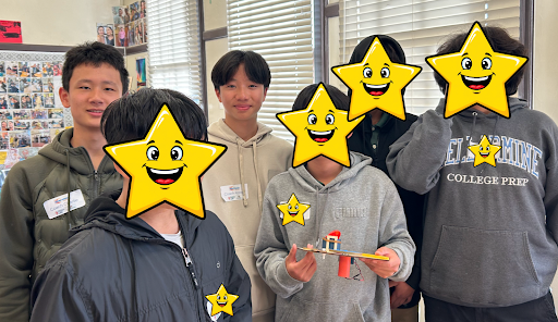 Crunch Club students working through a hands-on physics build