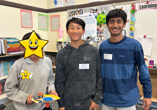 Crunch Club students showing off a completed build